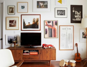 Integrate the television into a wall of frames