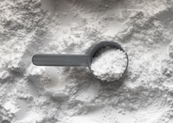 Protein powder with a scoop.