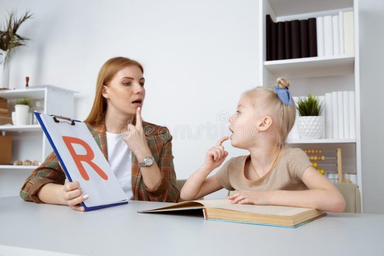 "A doctor giving therapy to the child patient"